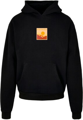 Merchcode Sweatshirt ‘Peanuts – Nevada’ Geel / Oranje / Zwart