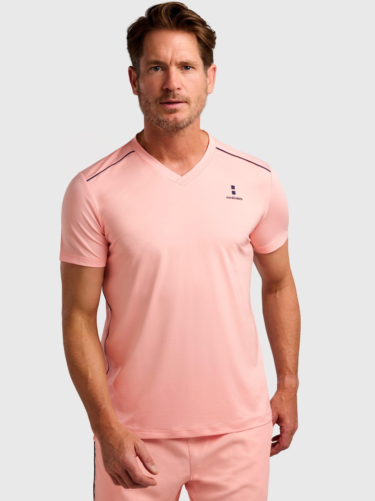 nordicdots Camiseta funcional 'Performance V-Tee'  melocotón
