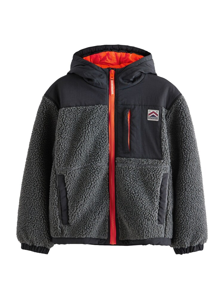 Superdry Jacke Jungen Größe 116 orange / schwarz / schwarzmeliert