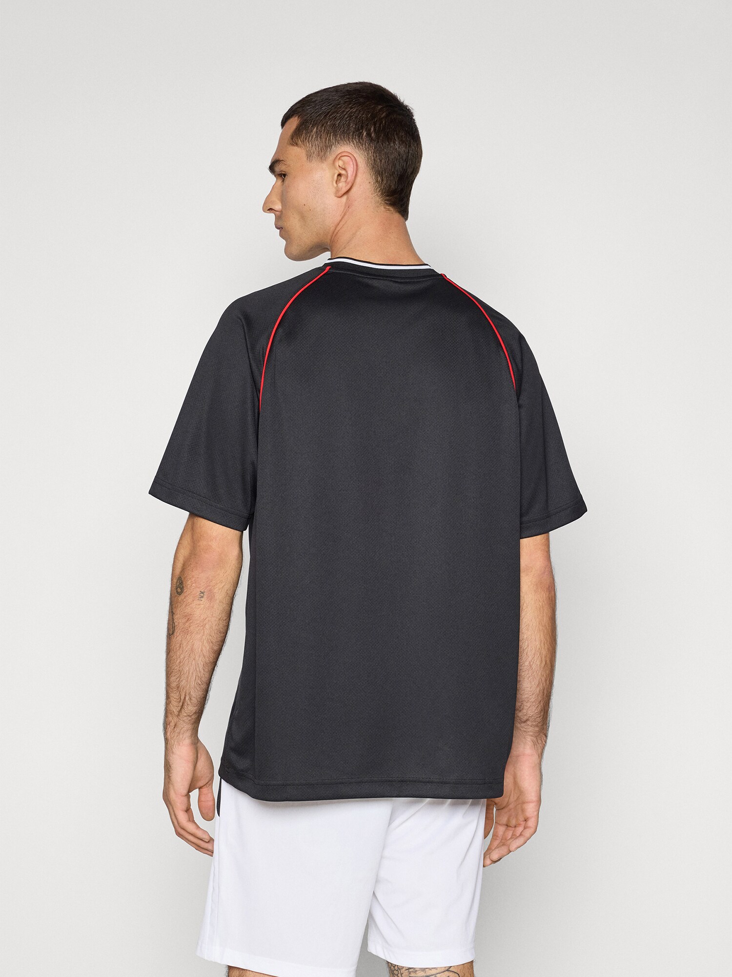 PUMA Funkčné tričko 'Essentials' červená / čierna / biela (obrázok 3)