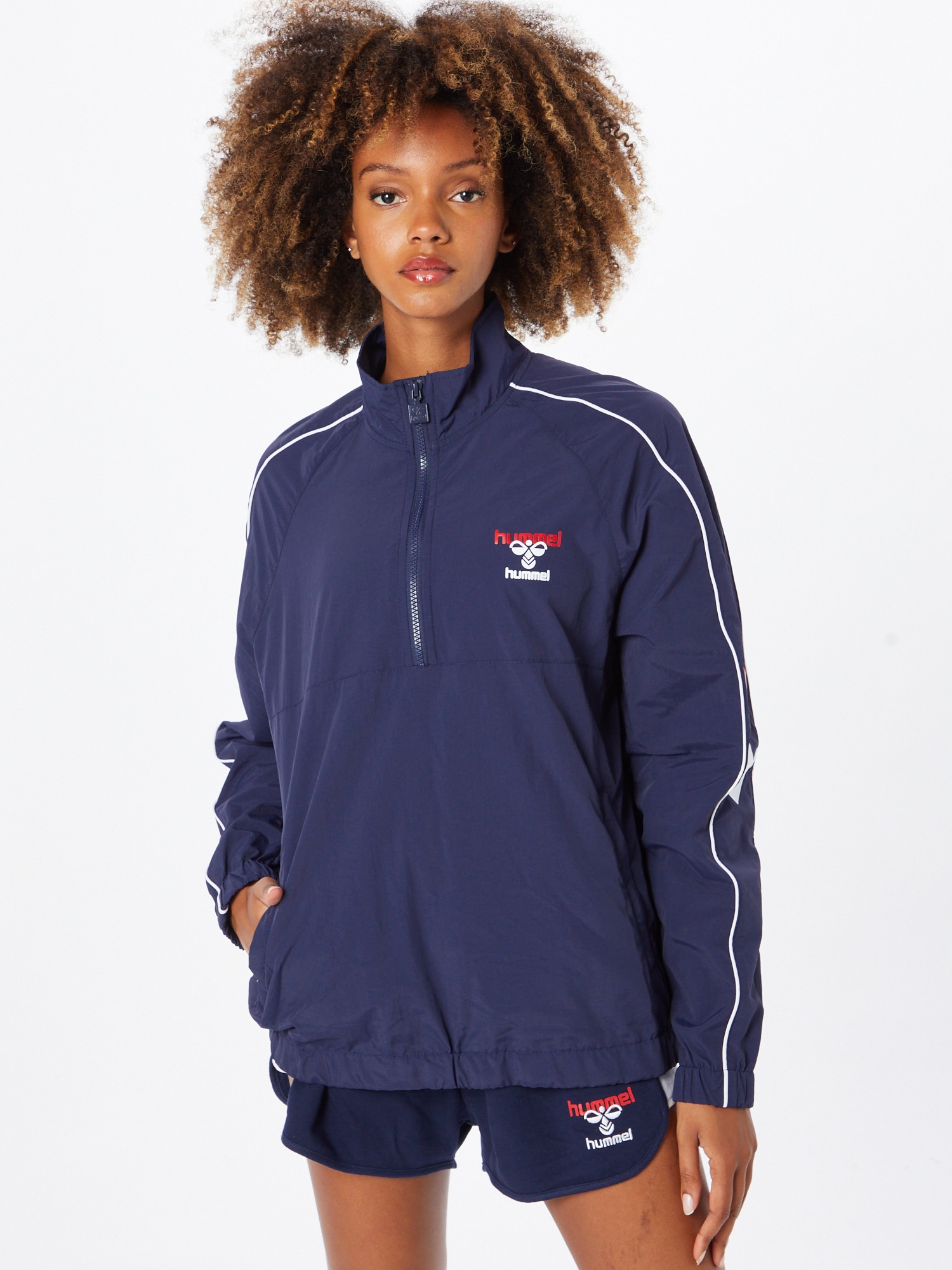 Hummel Sportdzseki  tengerészkék / piros / fehér termék 2. képe