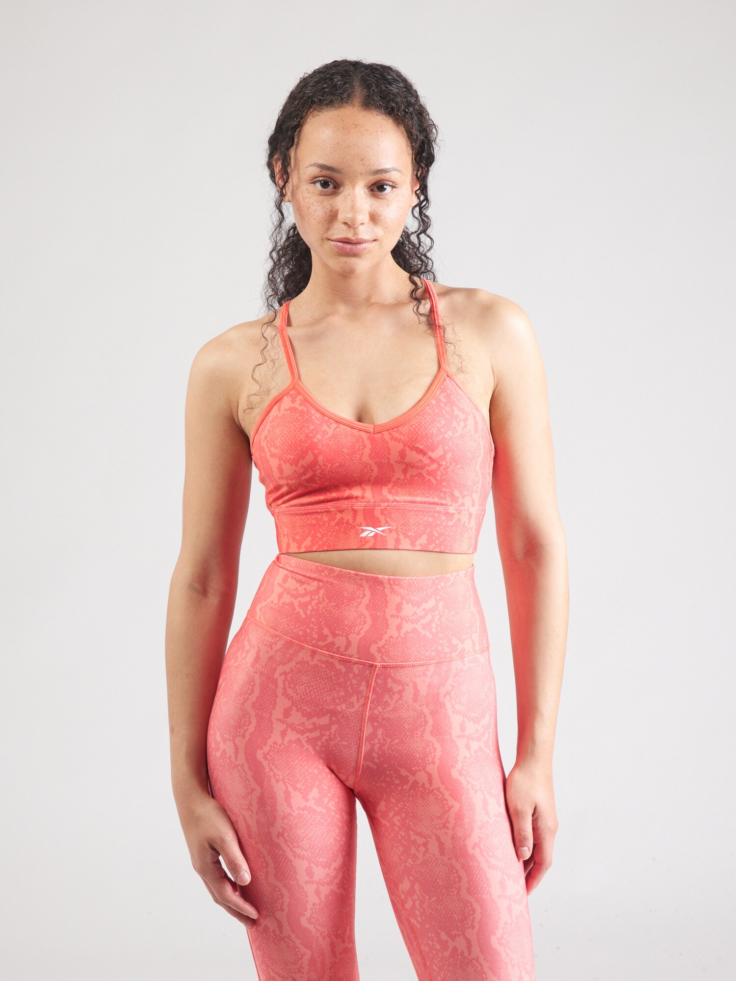 Reebok Sportmelltartók 'ID'  korál termék 2. képe