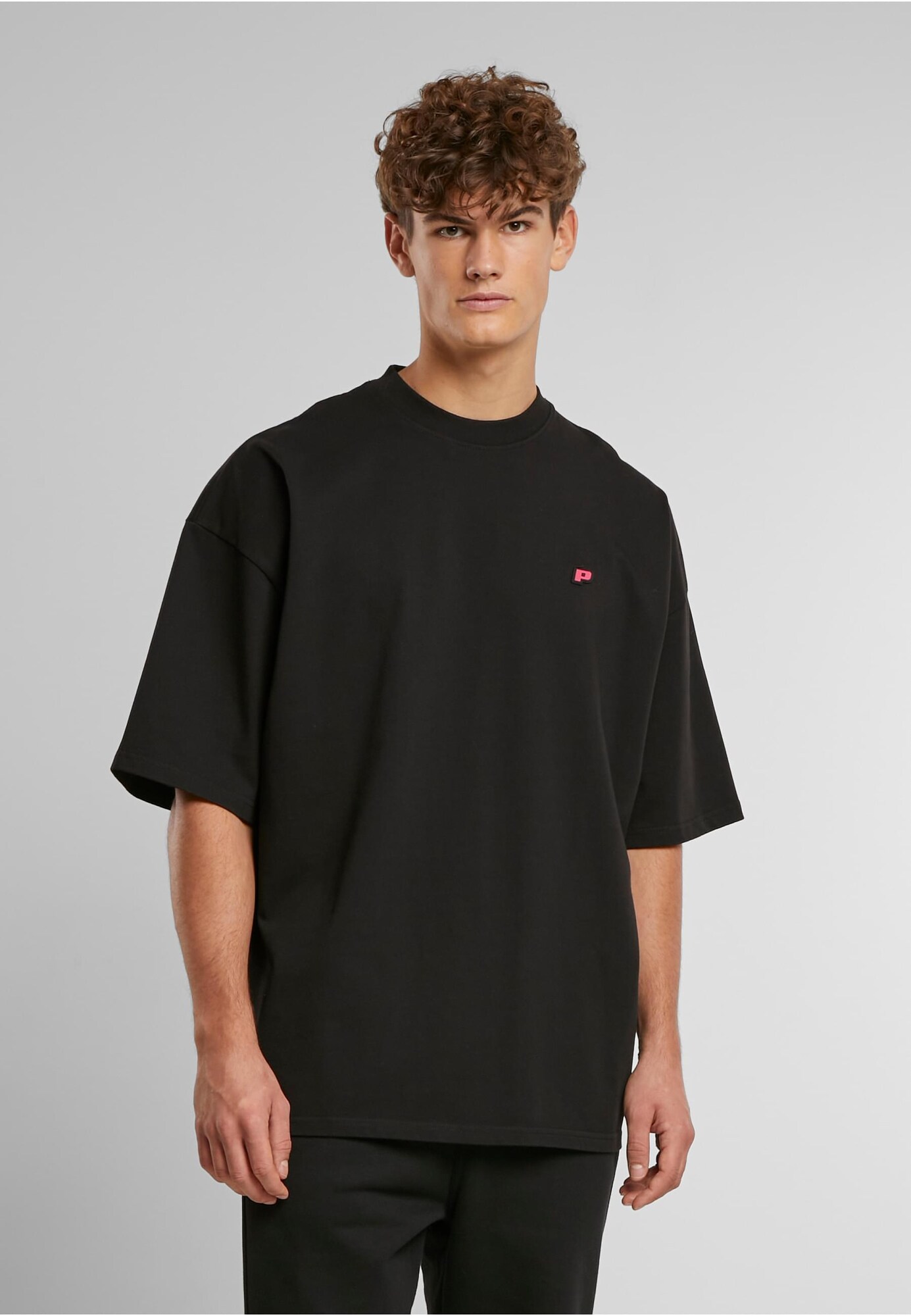 Pegador Camiseta 'Leono Boxy'  rojo / negro