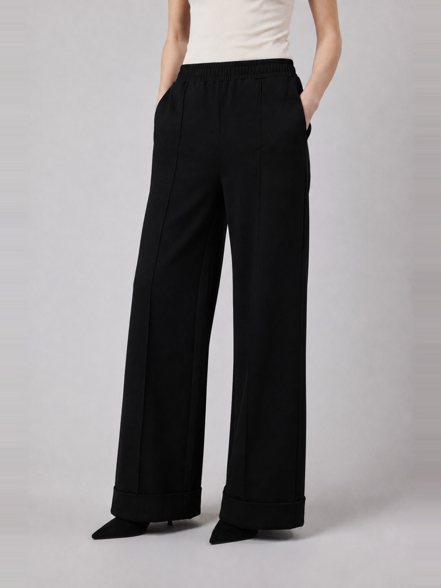 OWN Off With Nature Hlače 'Pantalone Palazzo con Risvolto in Interlock Black' crna