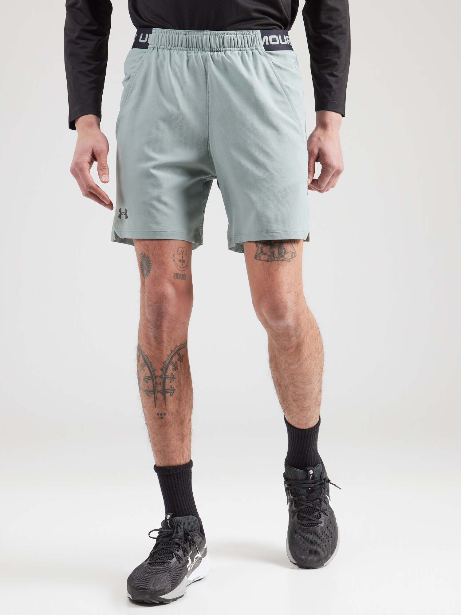 UNDER ARMOUR Sportnadrágok  világoszöld / fekete / piszkosfehér termék 2. képe