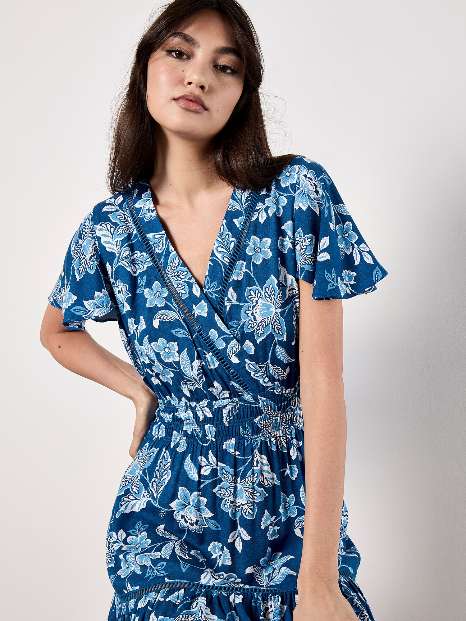 Thumbnail - Apricot Sarasa Floral Wrap Mini Dress