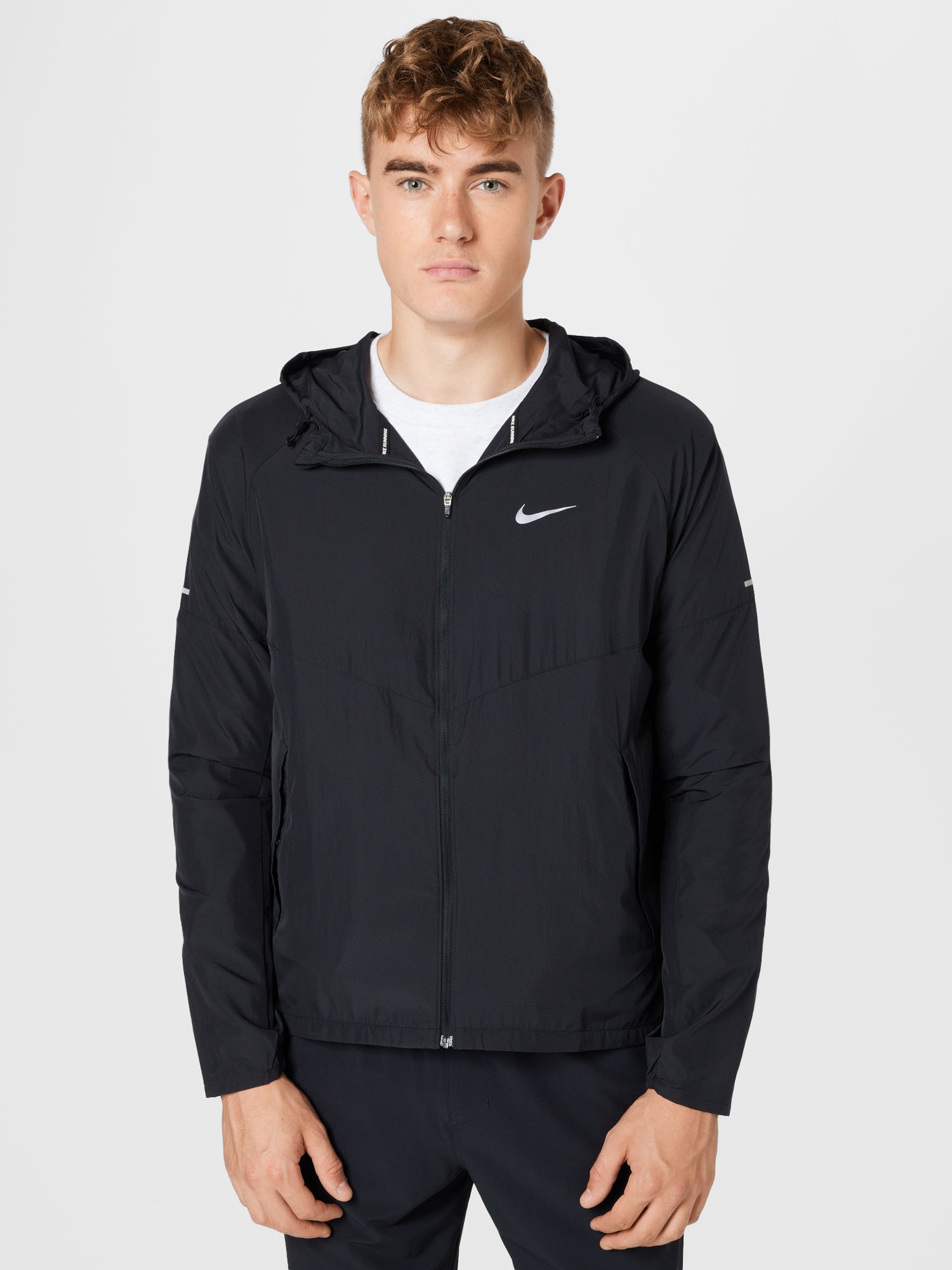 NIKE Sportdzseki  fekete / fehér termék 2. képe
