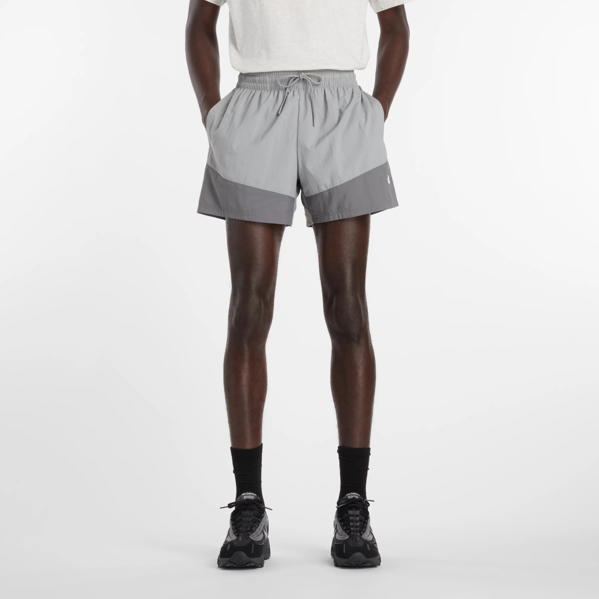 new balance Pantalón deportivo 'Sport Legacy' gris / gris claro / blanco