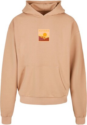 Merchcode Sweatshirt ‘Peanuts – Nevada’ Lichtbeige / Bruin / Geel