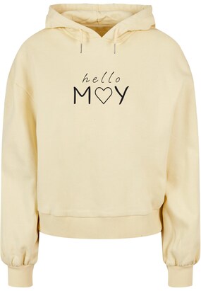 Merchcode Sweatshirt ‘Spring – Hello May’ Pasteelgeel / Zwart