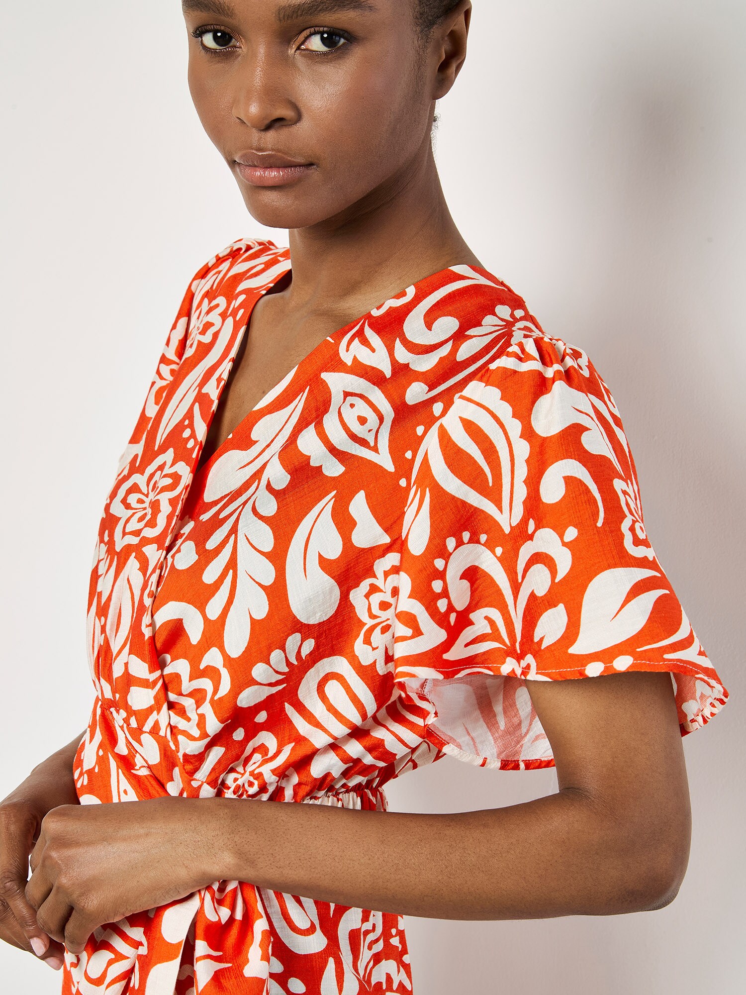 Thumbnail - Apricot Floral Paisley Wrap Mini Dress