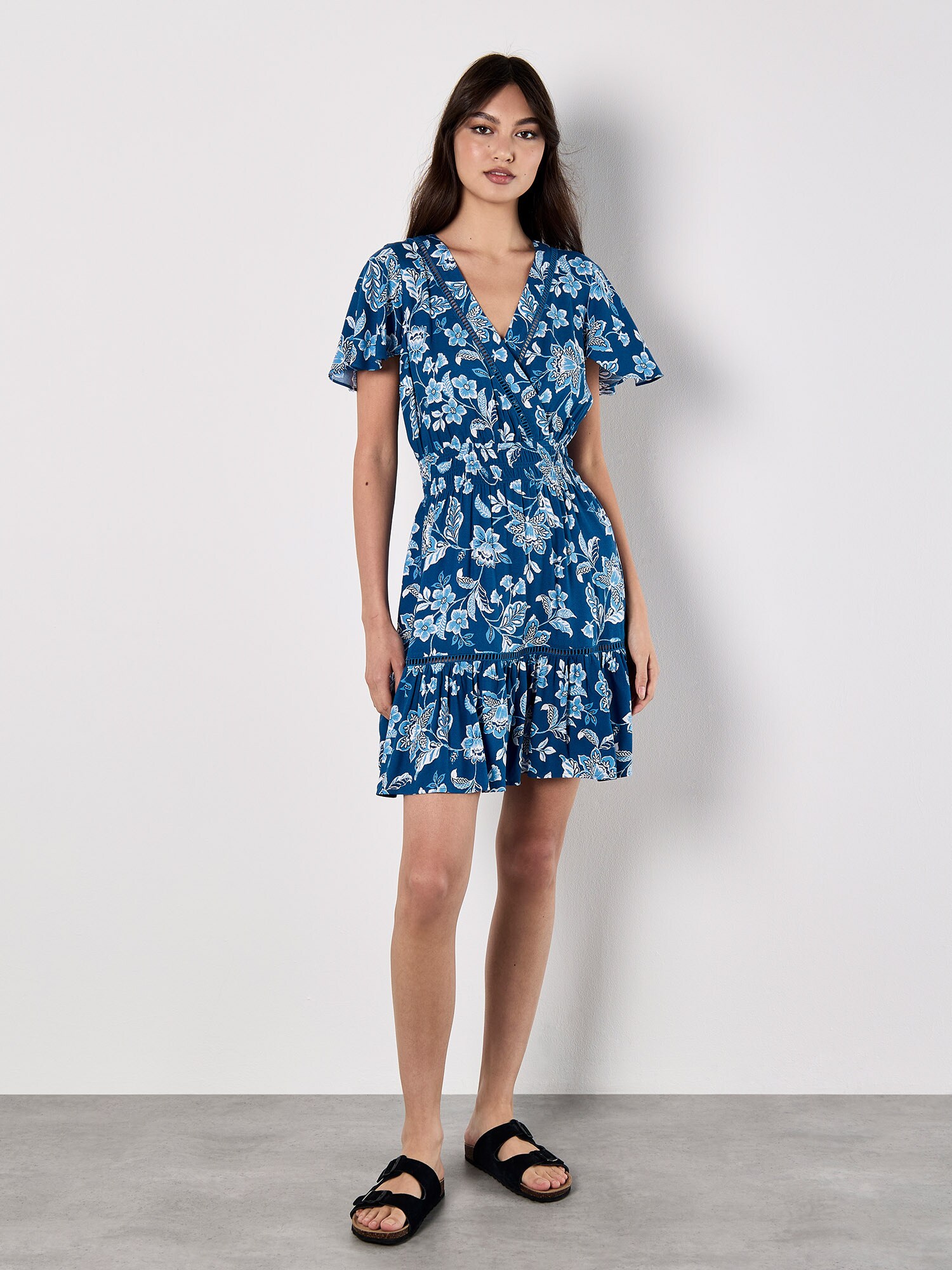 Thumbnail - Apricot Sarasa Floral Wrap Mini Dress