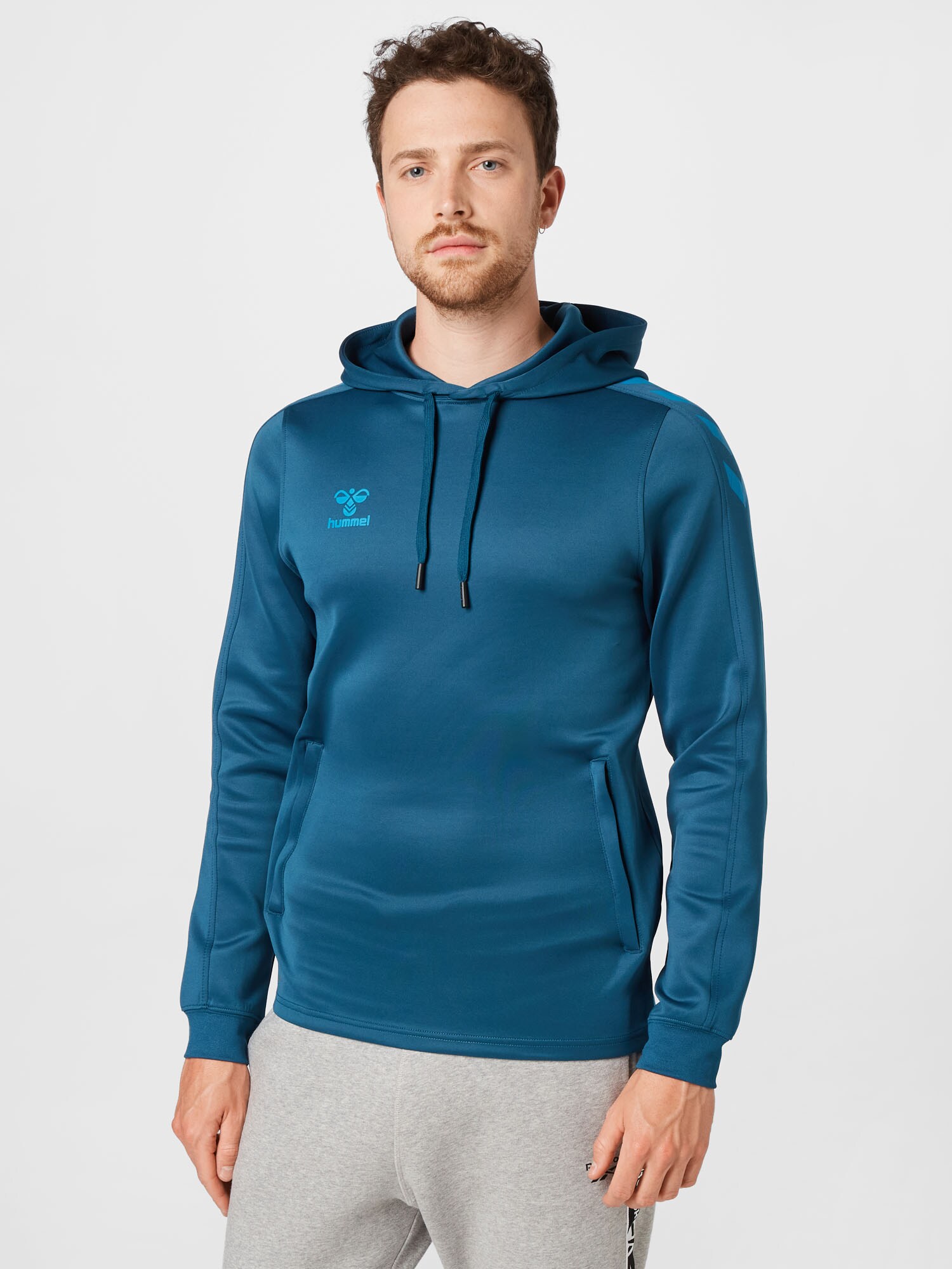 Hummel Sport szabadidős felsők  égkék / benzin termék 2. képe