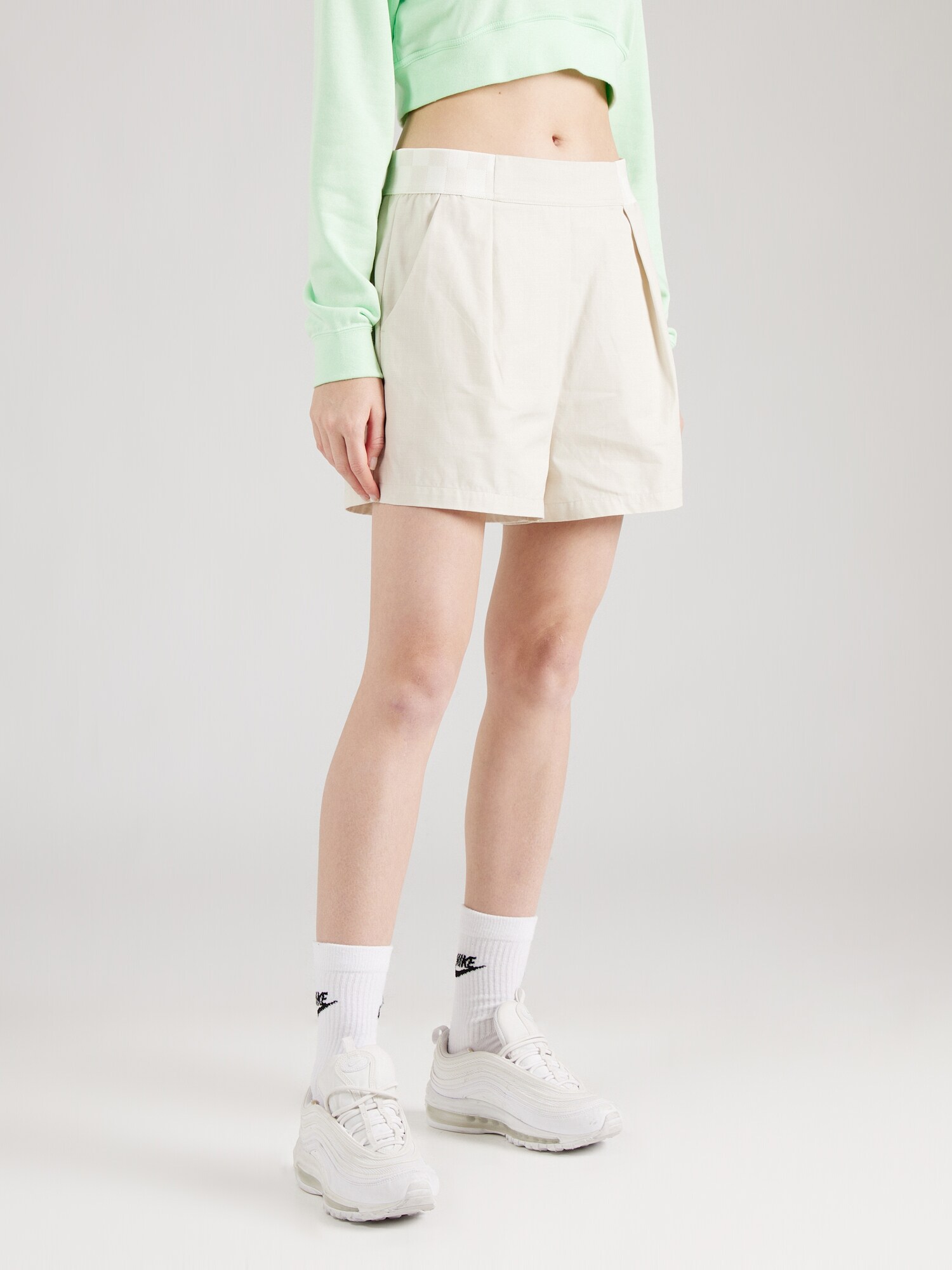 Nike Sportswear Élére vasalt nadrágok  krém termék 2. képe