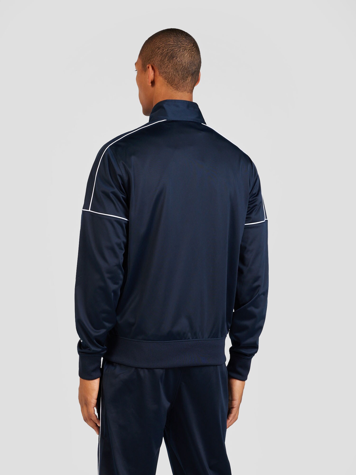 Champion Authentic Athletic Apparel Tréningruha 'ICONS'  tengerészkék / piros / fehér termék 2. képe
