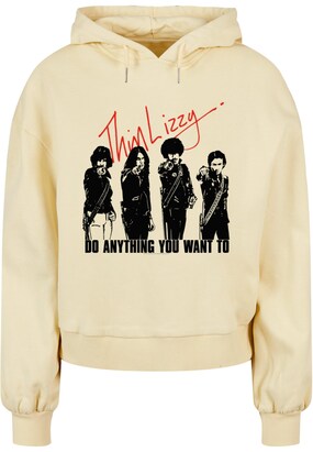 Merchcode Sweatshirt ‘Thin Lizzy – Do Anything’ Pasteelgeel / Bloedrood / Zwart gemêleerd