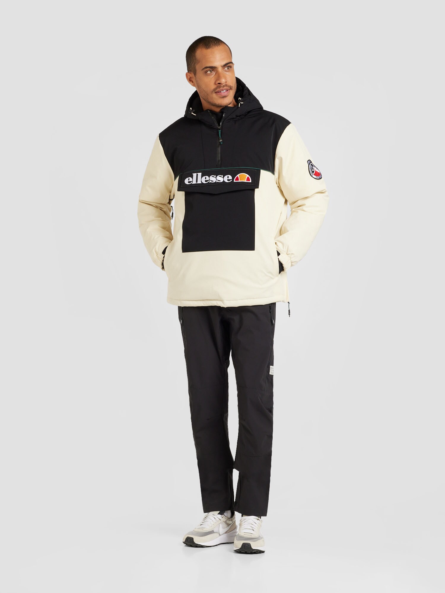 ELLESSE Sportdzseki 'Castrozza'  bézs / narancs / fekete / fehér termék 2. képe