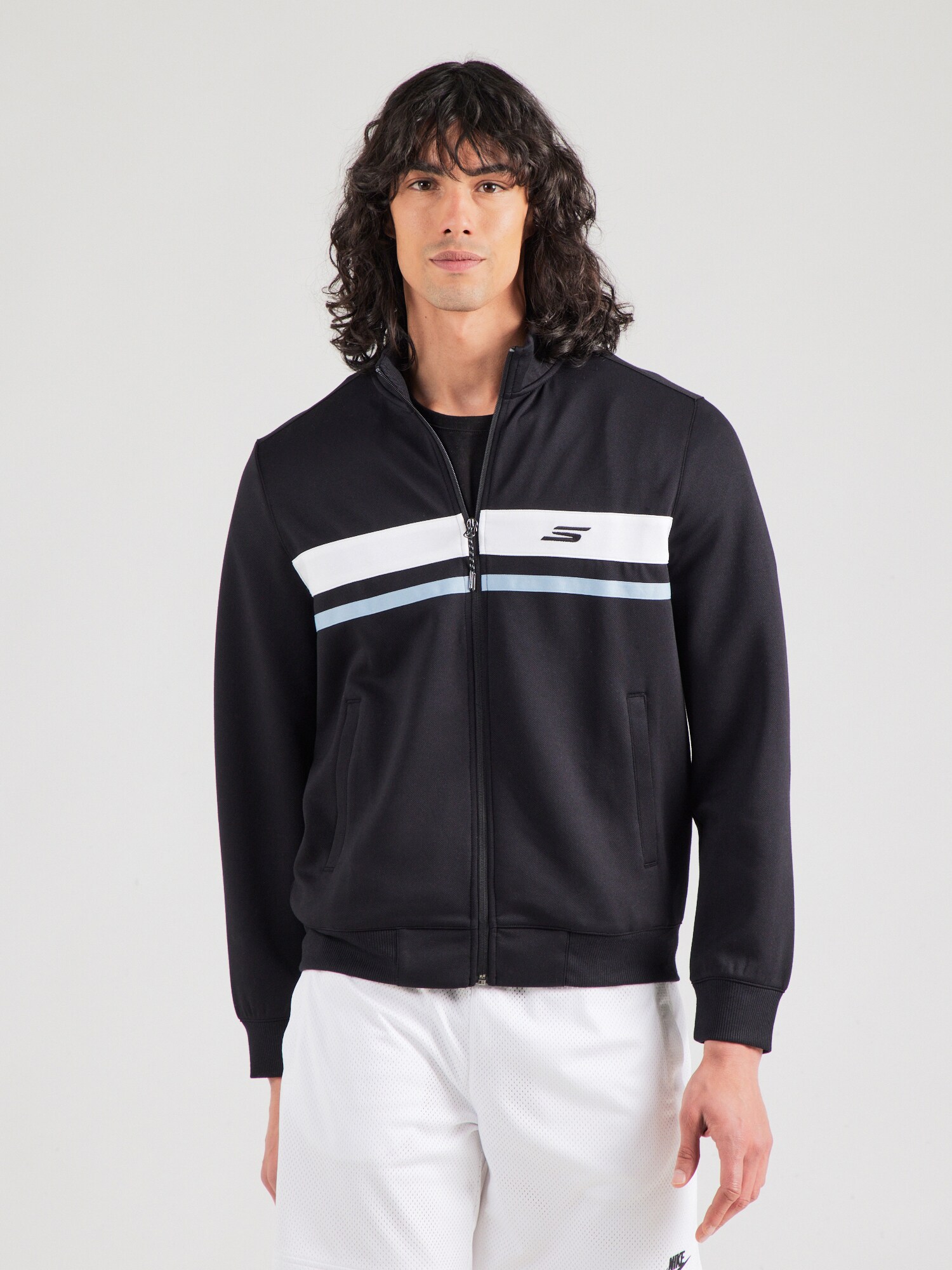 SKECHERS Tréningdzseki  pasztellkék / fekete / fehér termék 2. képe