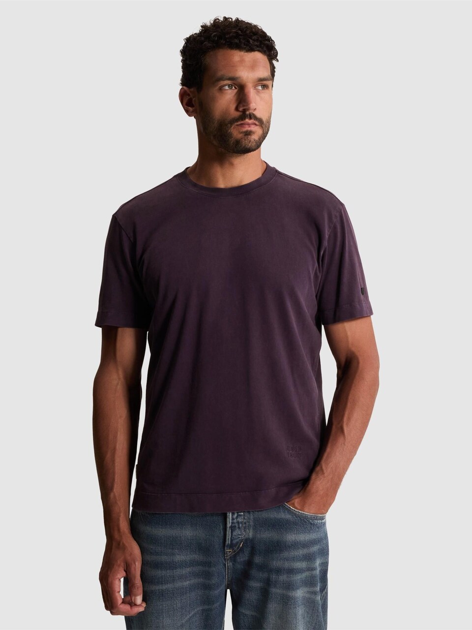 T-shirt 'T-shirt with garment-dye wash and off-placed branding'