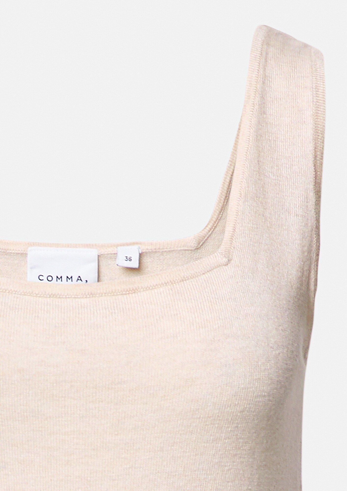 Thumbnail - COMMA Top