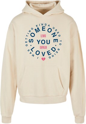 Merchcode Sweatshirt ‘Lewis Capaldi’ Sand / Blauw / Pink