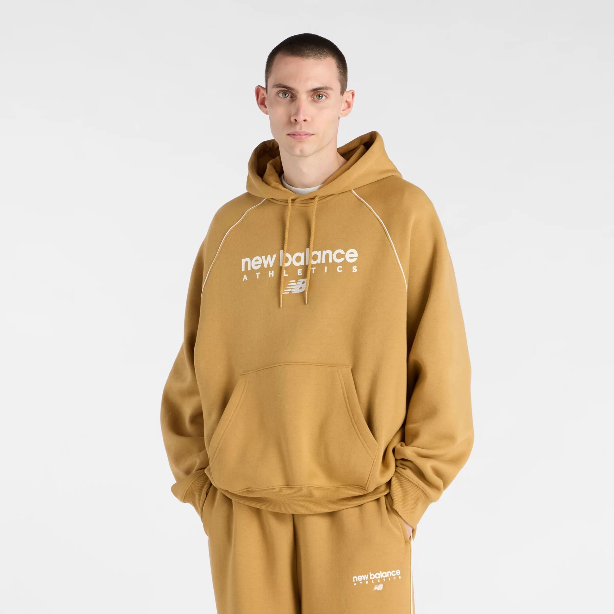 new balance Sudadera con cremallera 'Trackside' azafrán / blanco