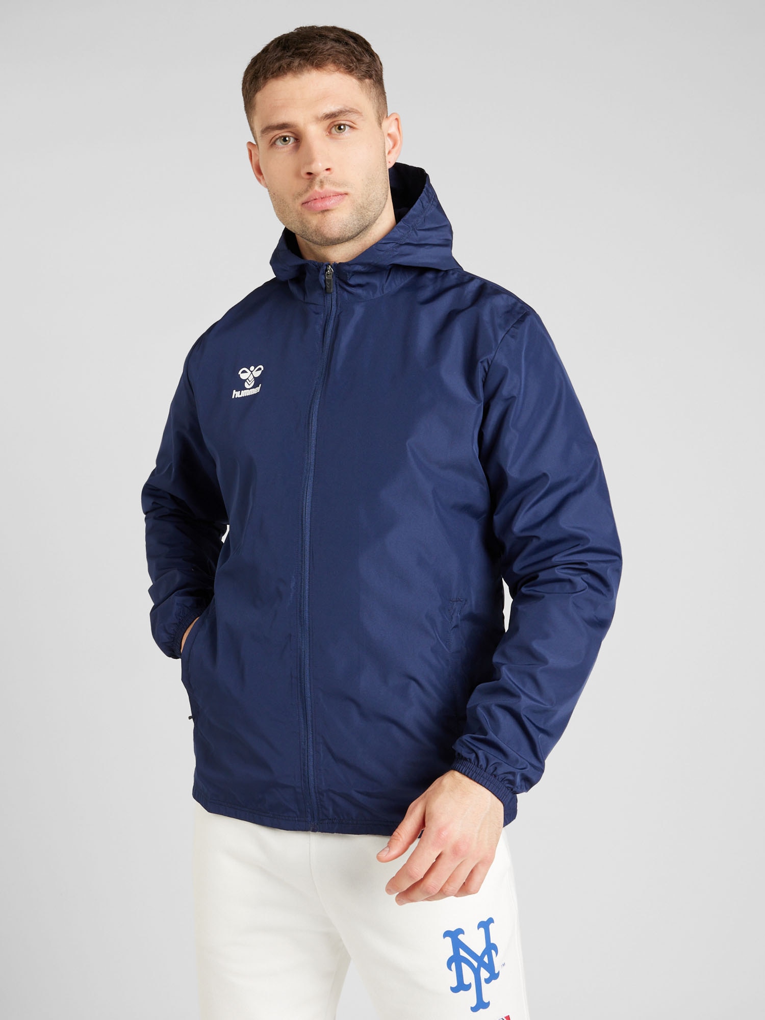 Hummel Sportdzseki 'ESSENTIAL'  tengerészkék / fehér termék 2. képe