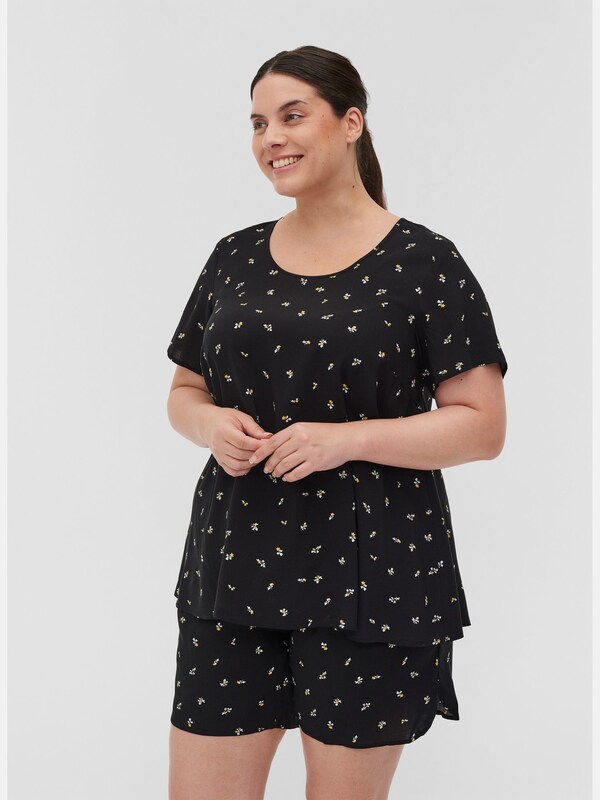 Bluse von Zizzi.
Schöne Bluse aus 100% Viskose mit A-Linie, die einen femininen und schönen Fall verleiht. Die Bluse hat kurze Ärmel, einen Rundhalsausschnitt sowie einen tollen All-Over Print, der einen femininen Touch verleiht.